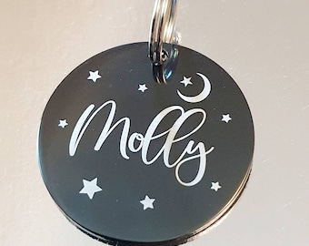 Dog ID tags, black disk with silver/white showing through, various fonts and sizes to choose from