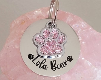 Pet tags engraved,  stainless steel available with pink, blue,green, yellow, red or silver paw.