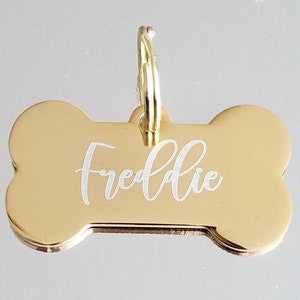 Bone pet tags laser engraved, available in silver, gold and rose gold.