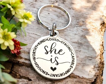 She is... keyring. Ladies gift,  the back can be personalised.