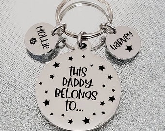 This Daddy belongs to... star design keyring,  Can be personalised to grandad, uncle etc.