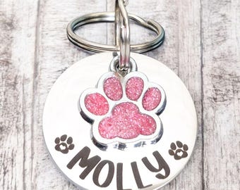 Pet tags engraved,  stainless steel available with pink, blue,green, yellow, red or silver paw.