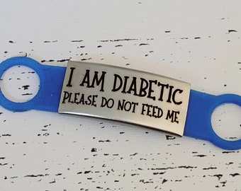 I am diabetic, Please don't feed me! silicone and Steel pet ID tags, 2 sizes and 4 colours to choose from. Laser engraved. Cat tag