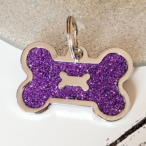 Quality coloured purple sparkly bone dog ID tag, laser engraved.