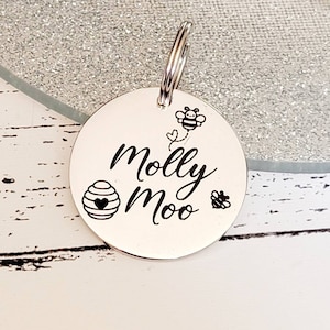 Bumble bee design.  Pet ID tags laser engraved,  stainless steel available in silver, gold and rose gold