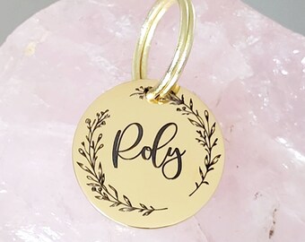 Tiny 20mm cat or puppy ID tags laser engraved,  stainless steel available in silver, gold and rose gold.  Gentle border design