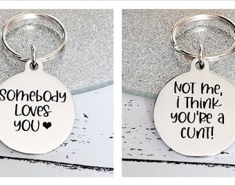 Somebody loves you . Profanity keyring.