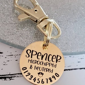 Microchipped and neutered pet ID tag,  Available in silver, gold, rose gold or black stainless Steel