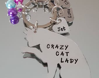 Cat keyring, hand stamped crazy cat lady. Can be personalised with names and any wording.