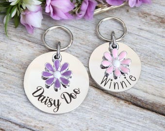 Silver pet ID tag with pink or lilac daisy charm. 25 or 30mm stainless steel.