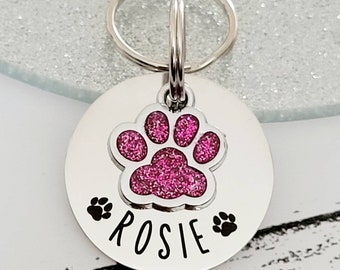 Pet tags engraved,  stainless steel available with pink, blue,green, yellow, red or silver paw.