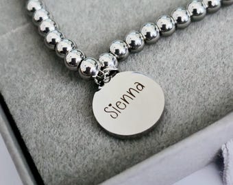 Personalised ladies 18cm beaded bracelet, with stainless steel round pendant. gift for her, ladies gifts