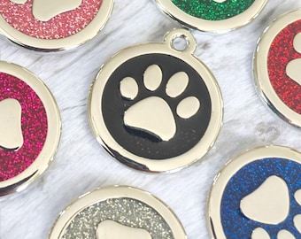 Quality silver alloy with GLITTER coloured paw dog or cat ID tag, laser engraved. Includes a split ring.