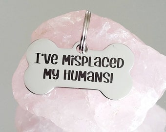 I've misplaced my humans design,Bone shaped pet tags laser engraved, available in silver, gold, rose gold, black, rainbow and blue