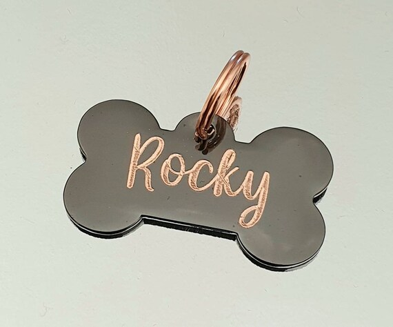 Dog ID tags, black coated brass bones with rose gold showing through, various fonts to choose from.