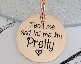 Feed me and tell me I'm pretty.  Pet ID tags laser engraved,  stainless steel available in silver, gold and rose gold