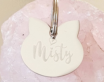 Cat ID tag , laser engraved, lots of fonts to choose from.