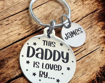 This Daddy is loved by... keyring,  Can be personalised to Grandad,  uncle etc.