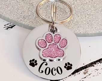 Pet tags engraved,  stainless steel available with pink, blue,green, yellow, red or silver paw.