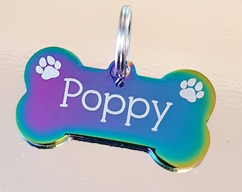 Rainbow coloured Dog ID tags, stainless steel bones. various fonts to choose from. Paw design.