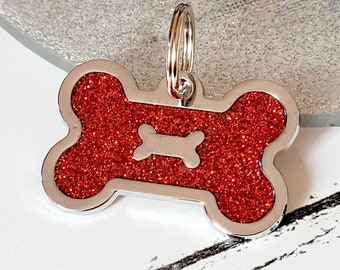 Quality coloured red sparkly bone dog ID tag, laser engraved.