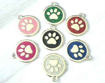 Quality silver alloy with GLITTER coloured paw dog or cat ID tag, laser engraved. Includes a split ring.