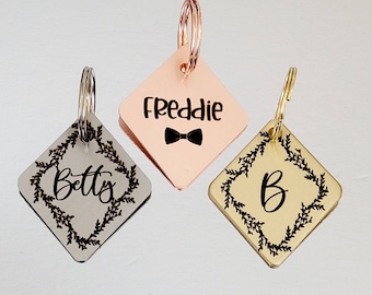 Dog ID tags, diamond shape, various fonts to choose from. Laser engraved 40mm