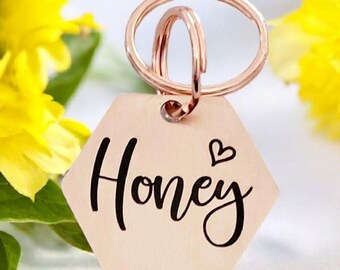 Beautiful star design stylish 30mm hexagon pet ID tag. Available in silver, gold, rose gold, blue or black Steel.