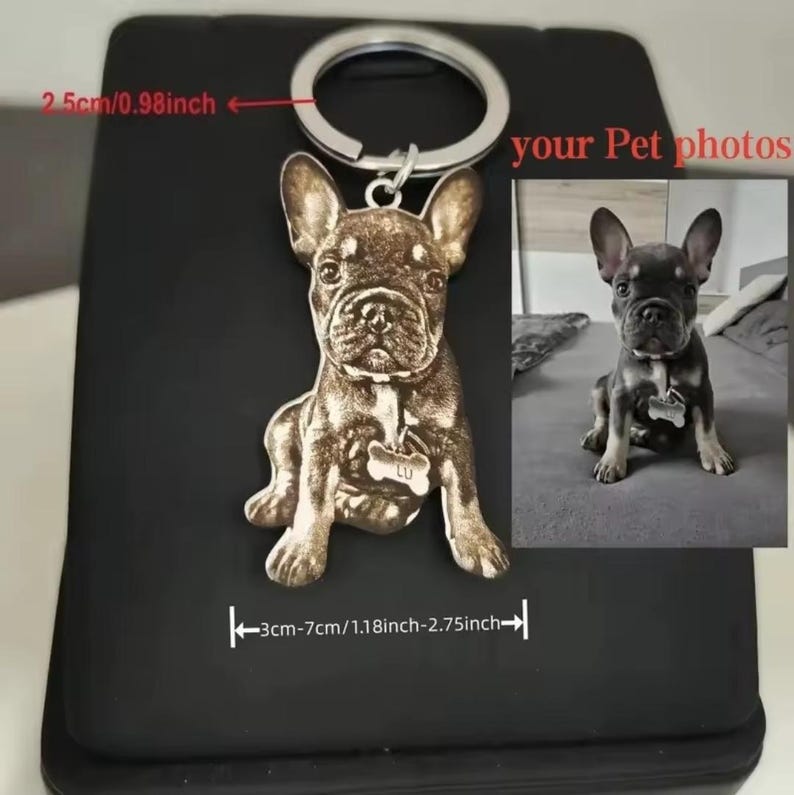 May include: A custom metal keyring featuring a laser-engraved image of a French Bulldog, matching the pet photo shown. The ring diameter is 2.5 cm, and the pendant width ranges from 3 cm to 7 cm. The text your Pet photos is visible.