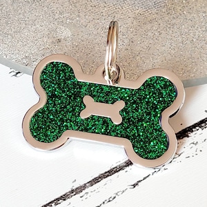 Quality coloured green sparkly bone dog ID tag, laser engraved.