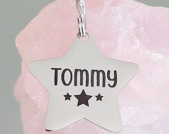 Star shaped pet ID tag, engraved, lots of fonts to choose from.