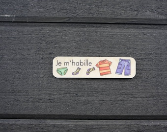 Piktogramm „Verantwortungs-Challenge“ aus Holz | Ich ziehe mich an | Aufgabentafel Die Herausforderungen des Rudels | 5-10 Jahre alt