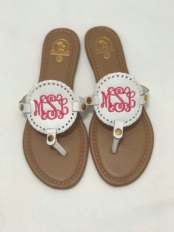 medallion flip flops