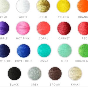May include: A color chart of embroidery floss with 18 different colors, including creme, white, gold, yellow, orange, purple, hot pink, coral, garnet, red, navy blue, royal blue, aqua, mint, bright green, black, grey, brown, and khaki.