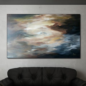 May include: A black leather sofa with a tufted back and rolled arms sits in a modern living room with a large abstract painting on the wall and two tall vases on the floor.