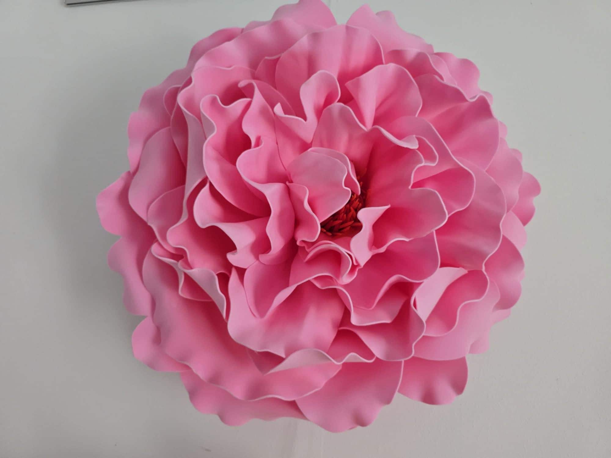 Close-up of a realistic life-size foam rose petal shaped with a double-sided flower petal mold