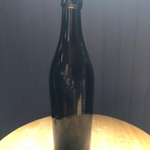 Super old brown glass with pontil vintage bottle with character in great condition