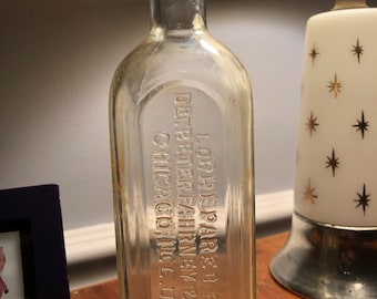 Vintage clear Glass 9 in. Apothecary Bottle Embossed Dr Peter Fahrney Reliable old time preparation for home use Chicago
