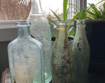 Grab bag of dirty bottle collection 4 bottles all need cleaning but in good condition