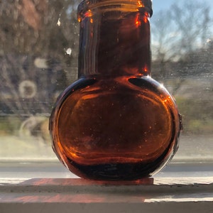 Sweet brown glass vintage Bovril bottle made in the USA pontil great condition