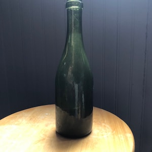 OLive Green glass vintage  bottle in good antique condition