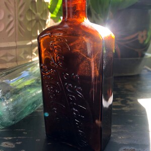 Vintage Brown Glass Apothecary Bottle Embossed Mary T Goldman St Paul Minn. 5.5in size