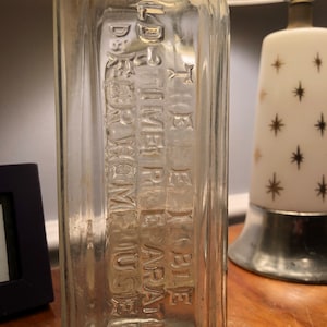 Vintage clear Glass Apothecary 7 inches Bottle Embossed Dr Peter Fahrney Reliable old time preparation for home use Chicago