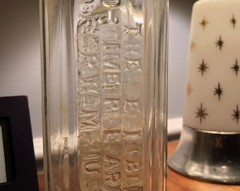 Vintage clear Glass Apothecary 7 inches Bottle Embossed Dr Peter Fahrney Reliable old time preparation for home use Chicago
