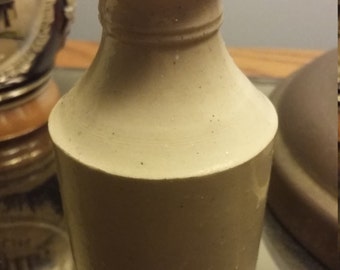 Underwood pitcher 2 inches small in amazing collectors condition rare and unusual stoneware