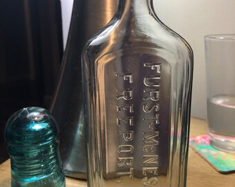 Vintage aqua Glass Apothecary Bottle Embossed Furst McNess Co Freeport Ill.