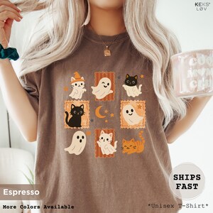 halloween-cat-and-ghost-comfort-colors-shirt, retro-spooky-season-tee, cute-black-cat-ghost-graphic-top, fall-halloween-gift-for-women