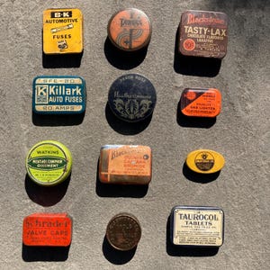 Vintage and antique collection of small advertising tins for medication, fuses, watch parts, cosmetics, and more, memorabilia, litho tins