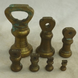 Vintage Set of 7 Brass Imperial Bell Weights from 1 lb to 0.25 oz - Decoration and Weighing Scales - Golden Patina - Made in England