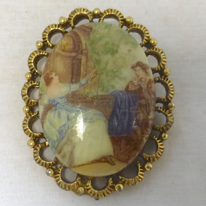 Vintage Limoges French Porcelain Fragonard Courting Couple Oval Brooch - Rococo style image in Gold Tone Decorative Frame